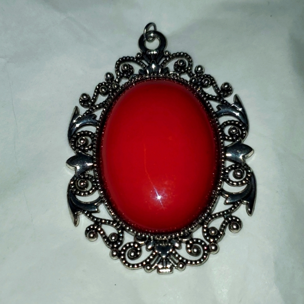 Silver tone large pendant